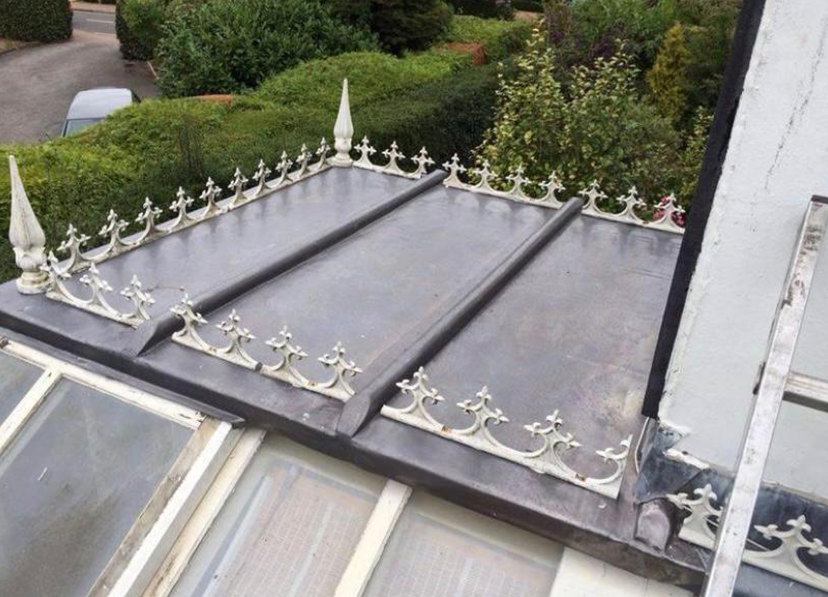 conservatory roof with metal railing